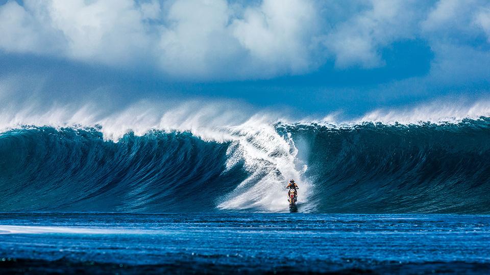 Australian Daredevil Robbie Maddison Surfs Giant Wave On His Dirt Bike